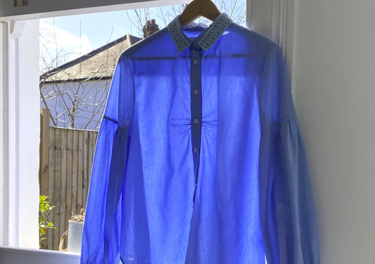 Saywood Edi Volume Sleeve Shirt Hanging in a Window to Air