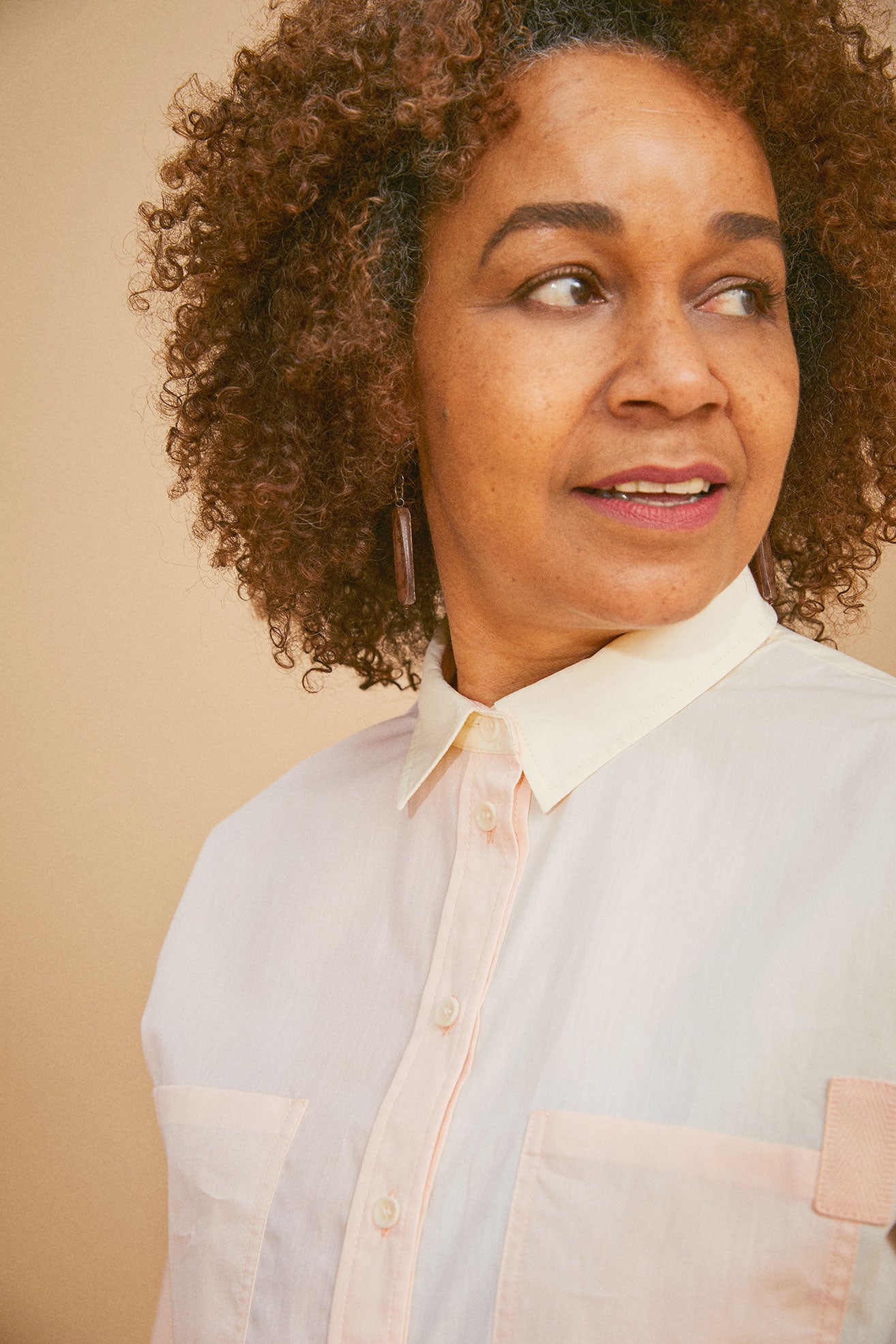 Womens patchwork colourblocked pastel shirt in orange and lemon, the Lela Shirt by Saywood. Boxy silhouette with patch pockets.