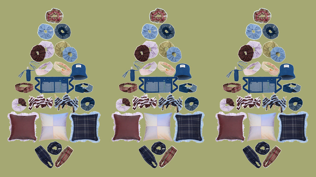 Three Christmas trees on a green background. Made from sustainable hair accessories, cushions, Christmas decorations and garden accessories, 