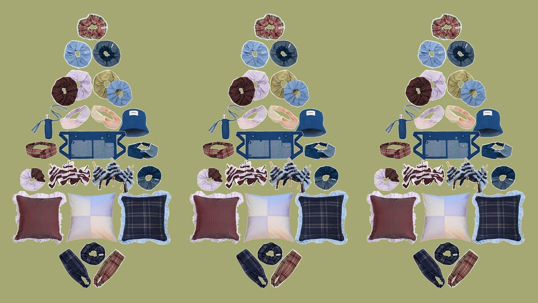 Three Christmas trees on a green background. Made from sustainable hair accessories, cushions, Christmas decorations and garden accessories, 