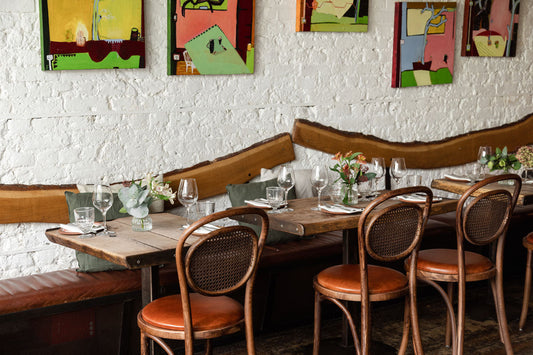 Sustainable London Restaurants | Rabbit British Bistro interiors with wooden furnishing.