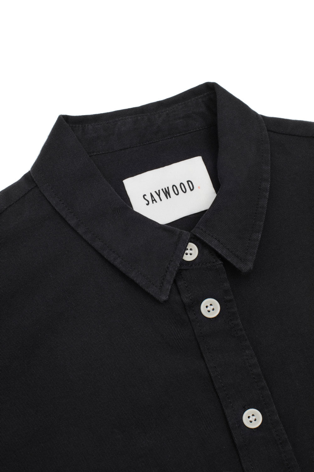 Black shirt with 'Saywood' label on a white background