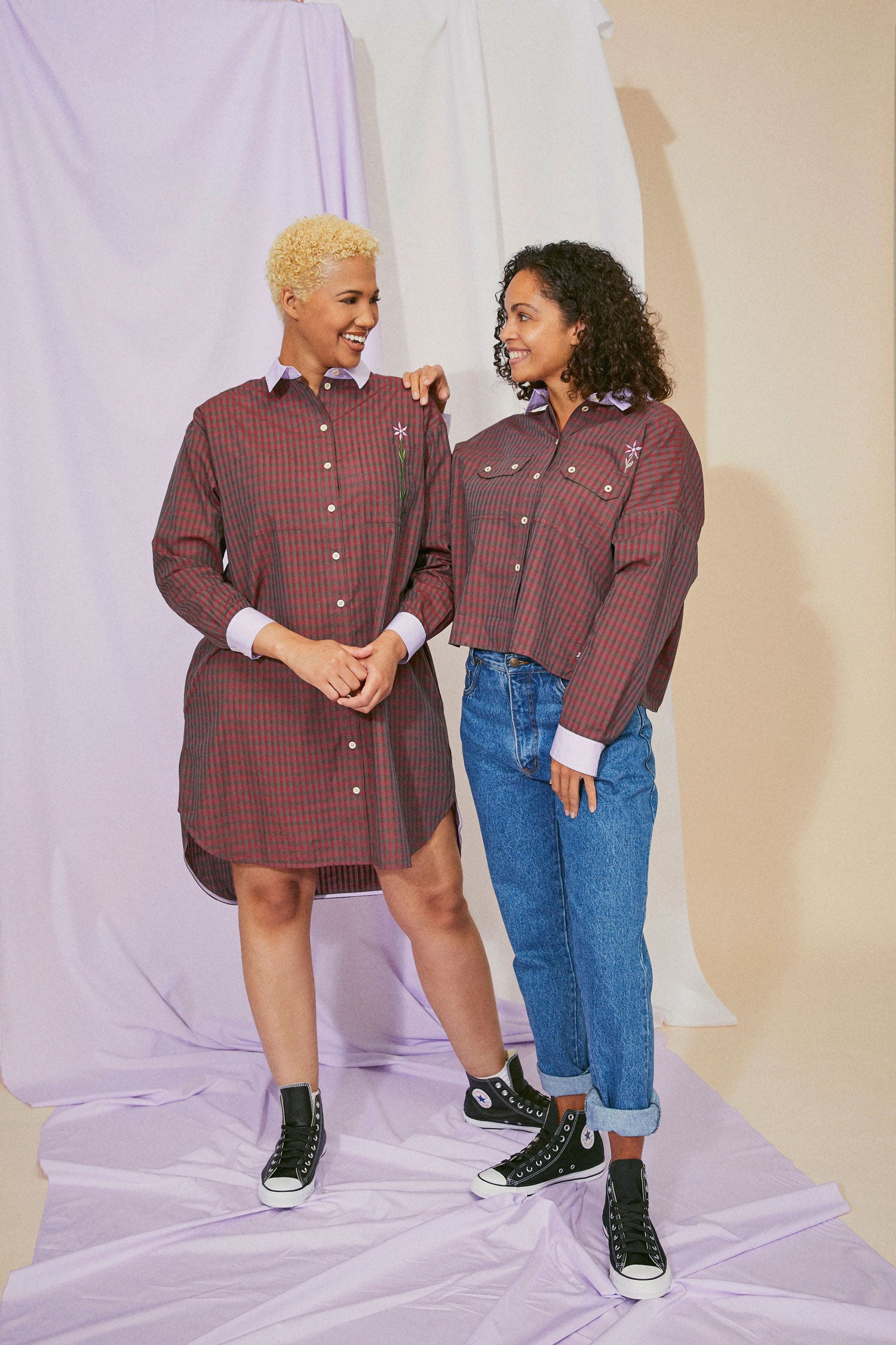 Women's Shirtdress, Saywood Studio, Etta Shirtdress, Red Check, two models stand together smiling. 2nd model wears the red check utility Jules Shirt