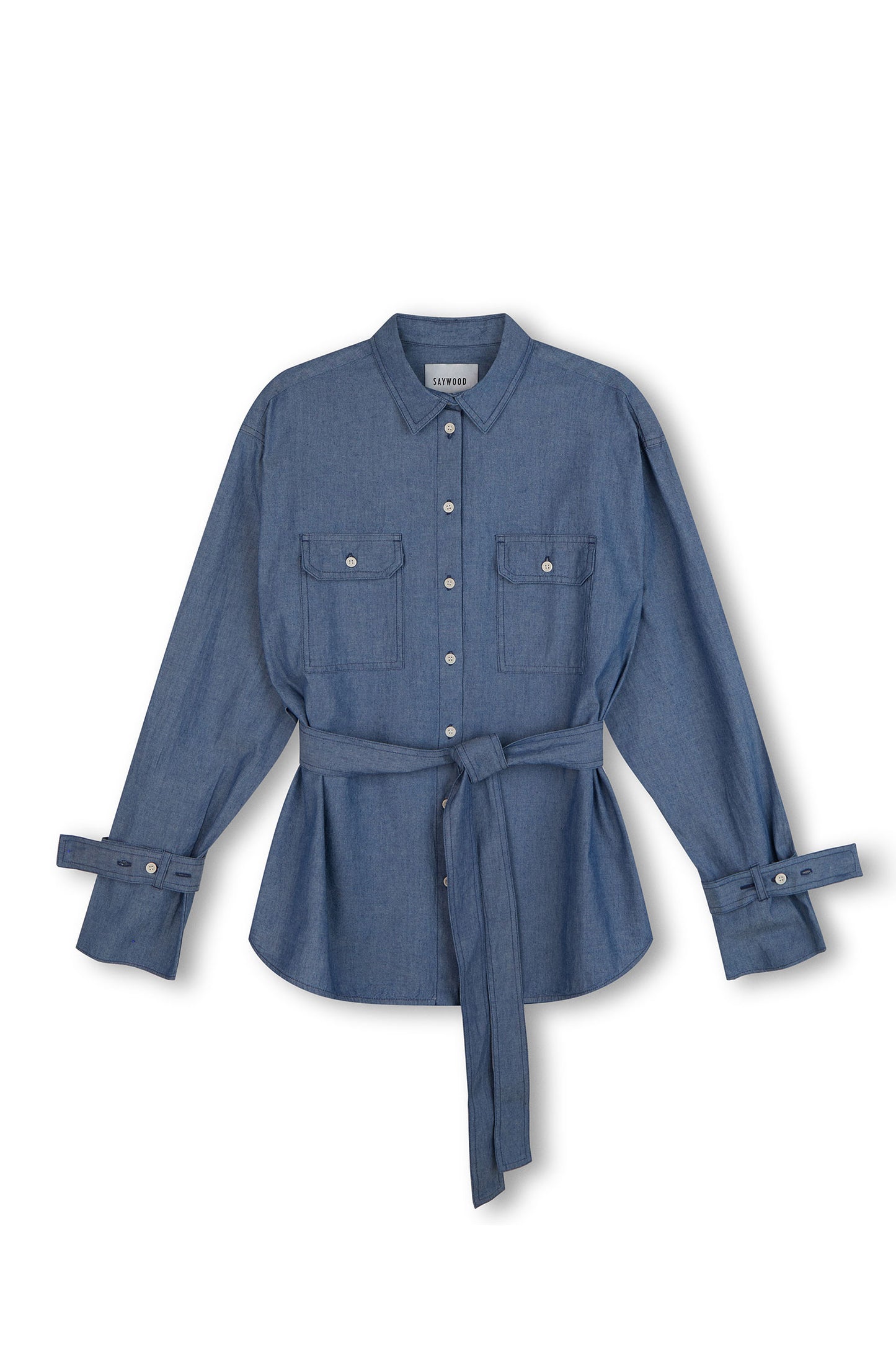 Womens Oversized Shirt Denim. Zadie Boyfriend Fit Shirt in Japanese Denim, light mid wash, with safari styling details, utility patch pockets, with a detachable tie belt and sleeve cuff details, by Saywood.