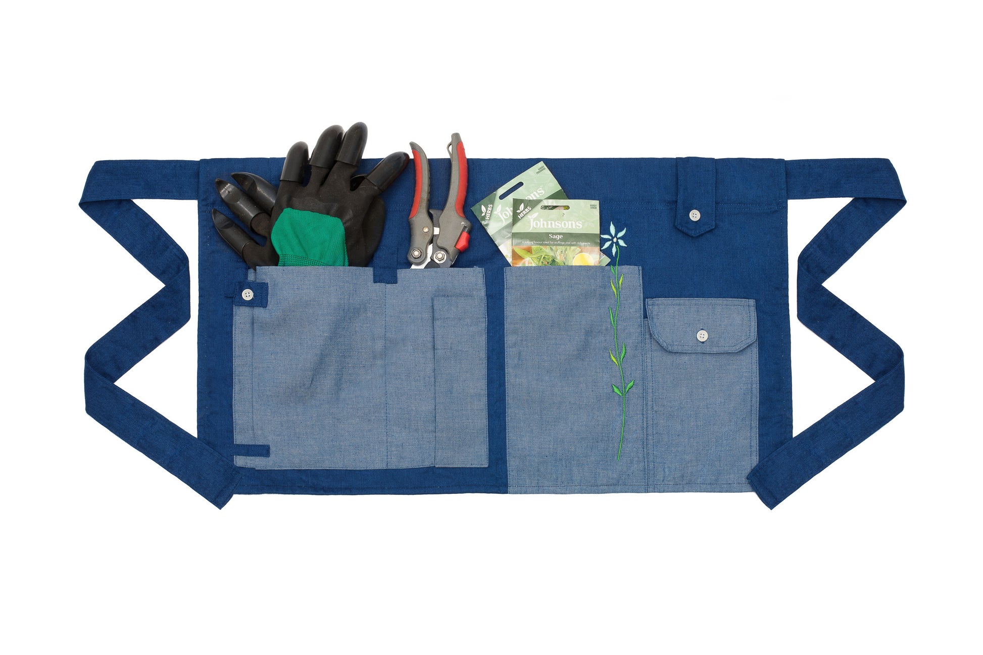 Tool Belt made in Japanese Denim, for the garden or multifunctional, by Saywood. Garden tools are tucked into the pockets of the multifunctional tool belt.
