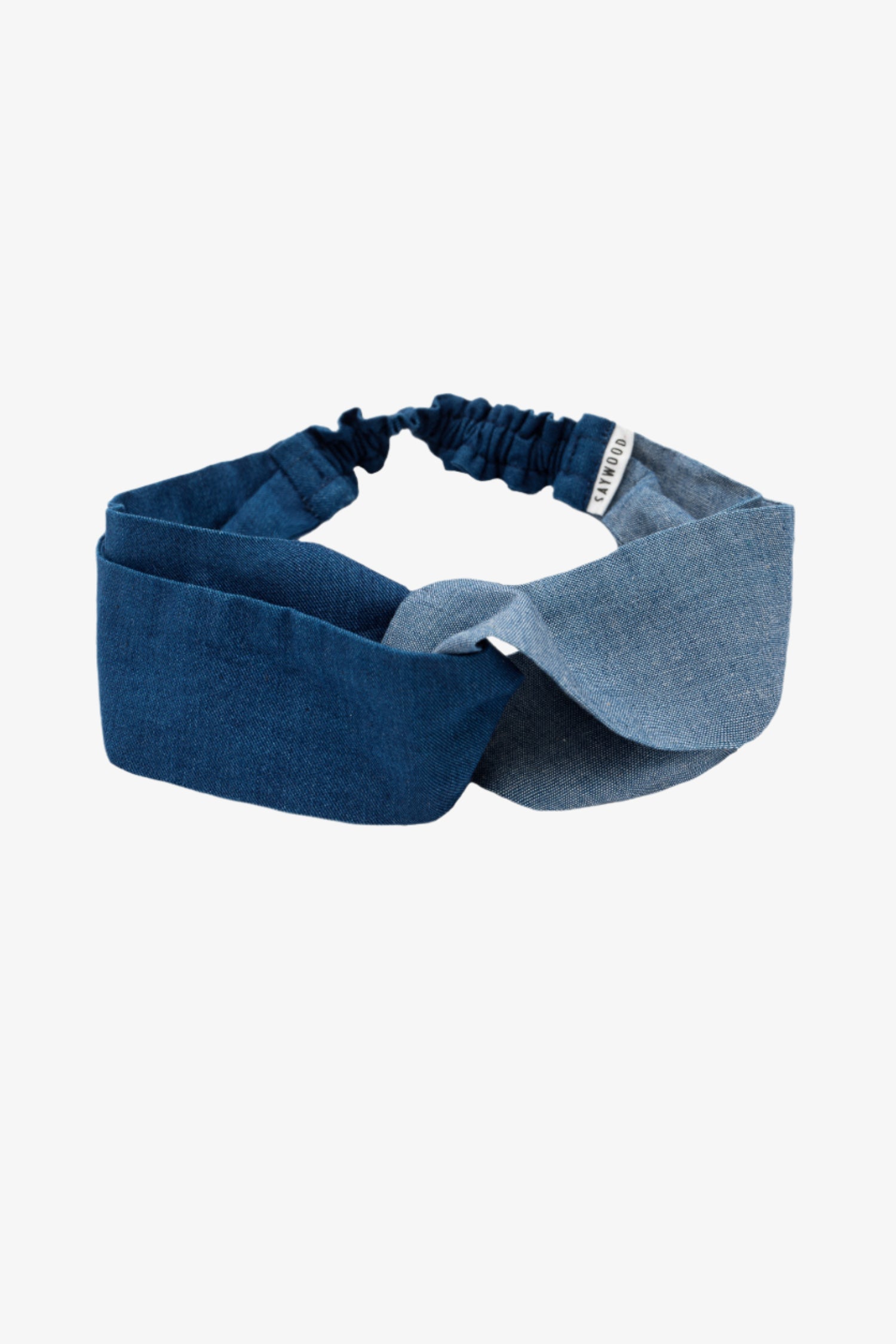 Saywood's Thandi Headband with twist effect, made from contrasting mid wash and light wash natural indigo Japanese denim.